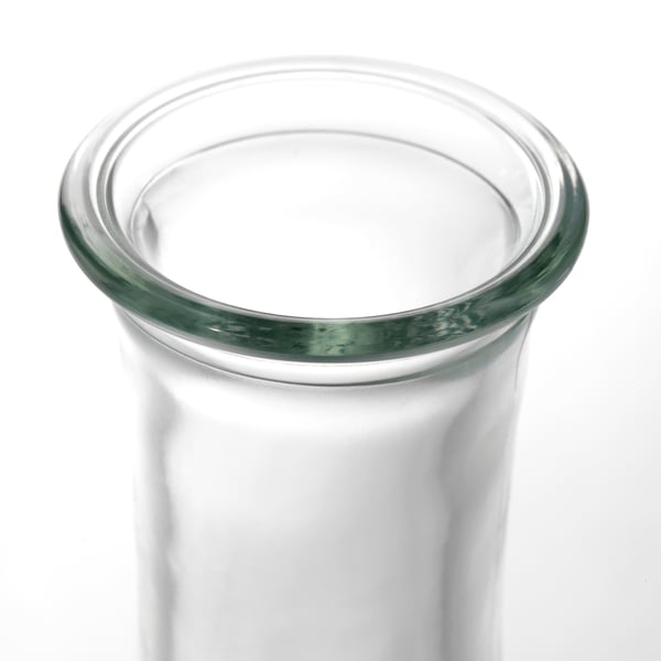 Clear, sleek glass vase with smooth, even rim, well-made.
