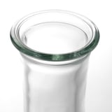 Clear, sleek glass vase with smooth, even rim, well-made.