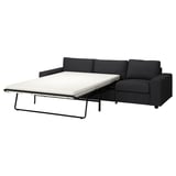Modern black sofa-bed combo with thick mattress, convertible design for comfort.