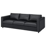Modern black leather sofa with clean lines, padded cushions, and minimalist design. Suitable for contemporary living rooms.
