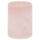 A light pink, cylindrical glass candle holder. Its smooth design and frosted finish create a soft, elegant glow.