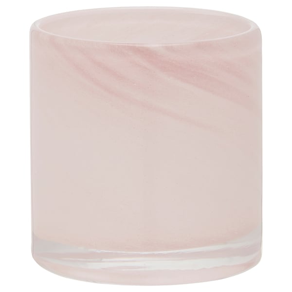 Rose-colored, cylindrical glass tealight holder with marbled design. Handcrafted for a unique look.