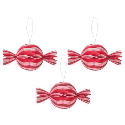 Three red and white paper honeycombs, shaped like candy, hang side by side in a festive, lollipop design.