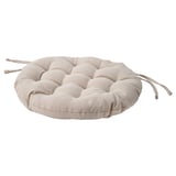 Padded round chair cushion, beige, recycled fabric, ties for secure fit.
