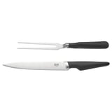 Ikea VÖRDA carving set: black knife & fork with stainless steel blades, ergonomic handles.