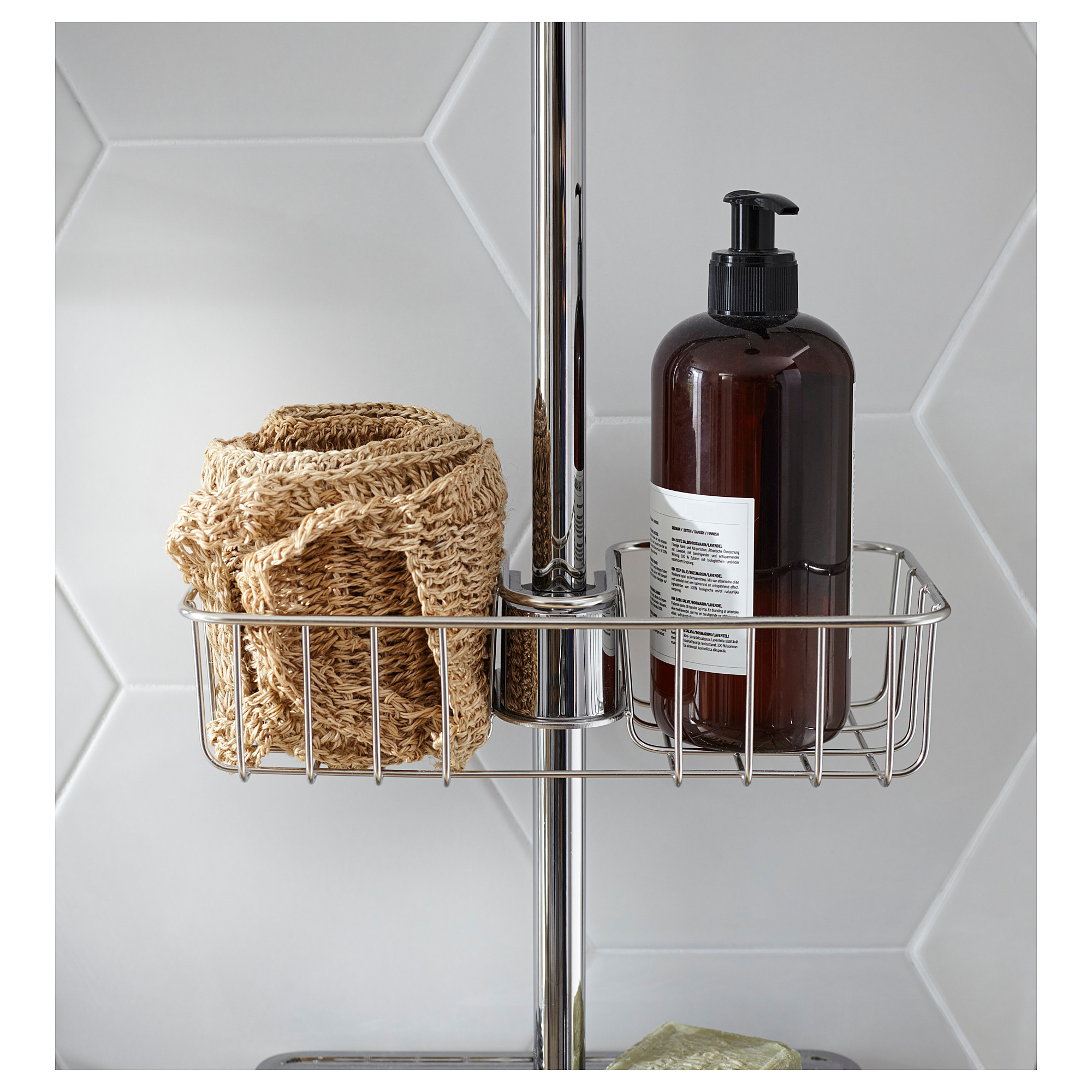 Metal bathroom shelf, holding a woven basket and soap bottle, attached to a shower rail.