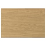 A rectangular oak-finished VOXTORP drawer front with clean lines and integrated handles, featuring a smooth surface and a modern design.