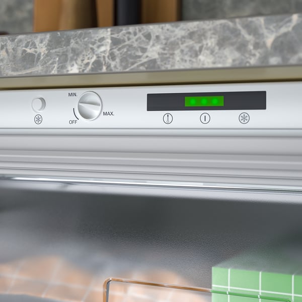 Modern freezer under counter with led control panel.