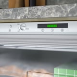 Modern freezer under counter with led control panel.