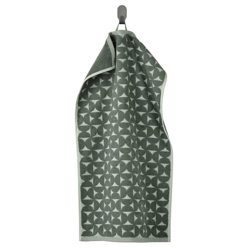 En hängande grågrön ÄNGSNEJLIKA-handduk med jacquardgeometrisk design.