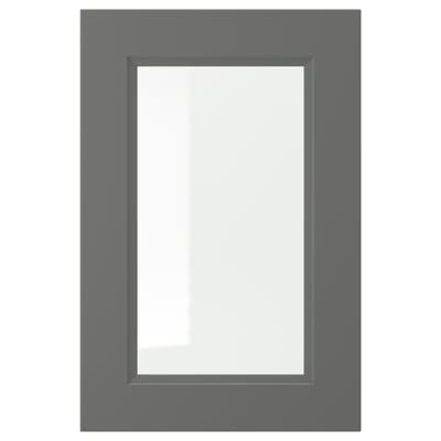 Grå skåpdörr med glaspanel, modern design.
