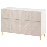 Ett ikea BESTÅ sideboard i vit och beige marmor med guldben.