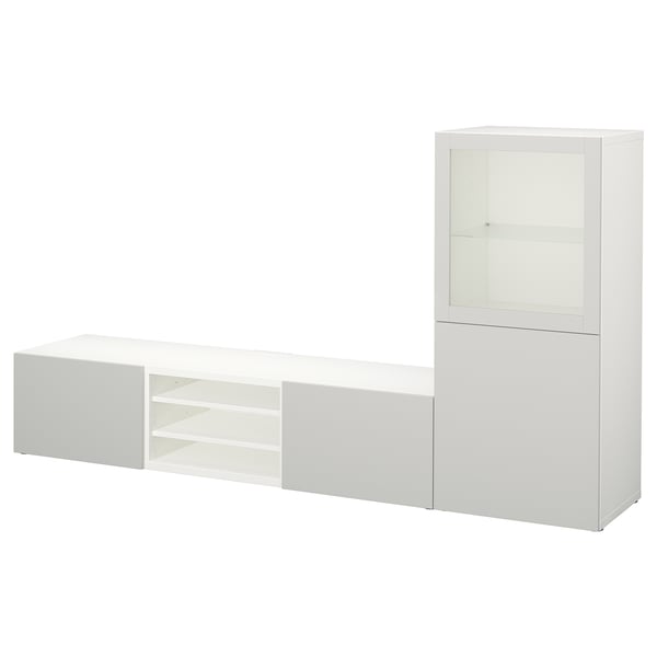 Vit förvaring BESTÅ: elegant design med hyllor, lådor och glasdörrar för modern organisation.