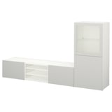 Vit förvaring BESTÅ: elegant design med hyllor, lådor och glasdörrar för modern organisation.