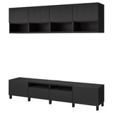 Svart BESTÅ tv-bänk och väggskåpsset. Modern mörk trädesign med justerbara hyllor och lådor.