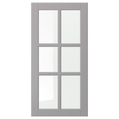 En grå skåpdörr BODBYN med en klassisk, fasad paneldesign.