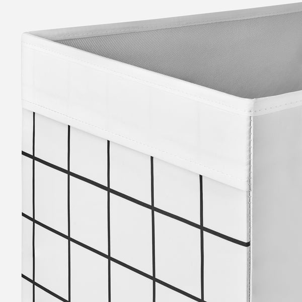Förvaringsfack i vitt tyg med svart rutmönster, snyggt utformat för kallax hyllor, med robusta sömmar och hållbar design.