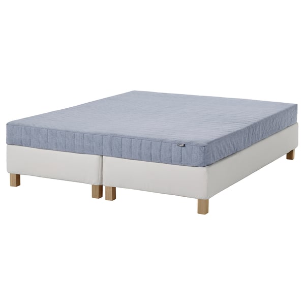 ESPEVÄR/VADSÖ: vit sängstomme med blå madrass. Modern, elegant design. Bonnell-fjädrar för stöd. Redo för en bekväm sömn.