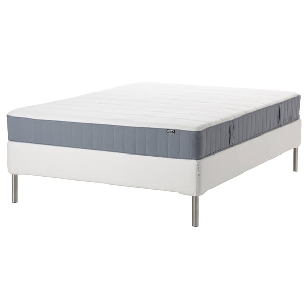 IKEA vit och grå rullmadrass med metallben.