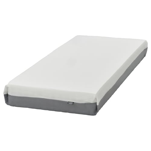 En vit och grå fägeråse madrass, rektangulär, med vadderad grå kant, designad för komfort och stöd.