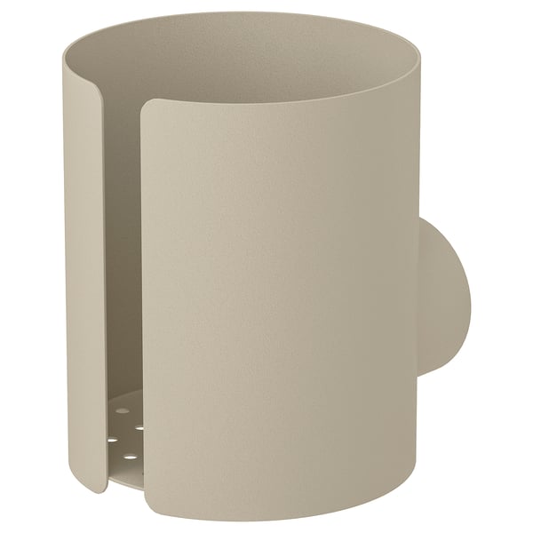 FLORSJÖN beige cylindrisk vägghållare, tillverkad av stål, med dekorativa utskärningar och en adapter i rostfritt stål.