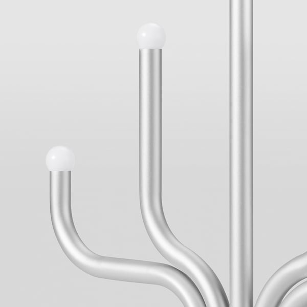 Silver modern led kandelaber med elegant design och vita sfäriska spetsar som avger mjukt, varmt ljus.