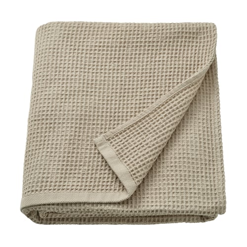 IKEA GULLDYNA-handduk, beige. Tillverkad av 50% återvunnen bomull, vikt fyrkantig form, texturerad våffelvävsdesign.