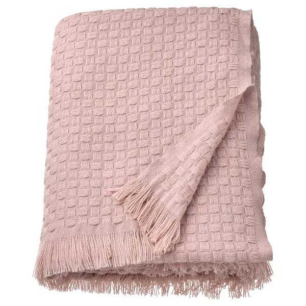 Ljusrosa HORNMAL plädfilt, vävd struktur med fransar, 100 % återvunnen polyester.