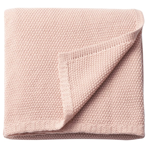 Ljusrosa, mjuk, hopvikt filt. Tillverkad av återvunnen polyester. Stickad struktur, rektangulär.