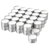 Samling av vita JUBLA-ljus i silverfärgade aluminiumhållare, snyggt arrangerade i rader, cylindrisk form.