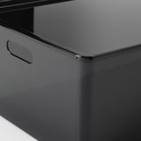Svart förvaringslåda med elegant handtag som visar upp högkvalitativ finish och robust design.