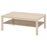 Beige ikea LACK soffbord med över- och underhylla.