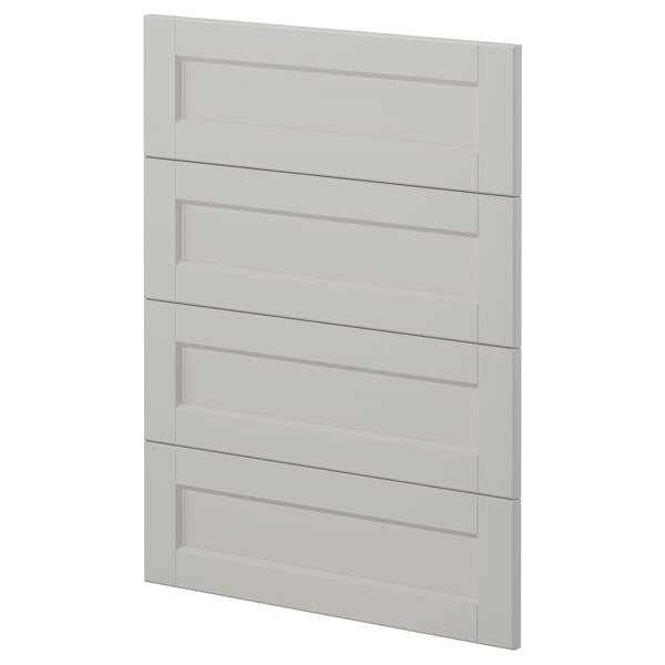 En modern, benvit köksskåpslucka från ikeas METOD system, med fem horisontella paneler och en elegant, fasad kantdesign.