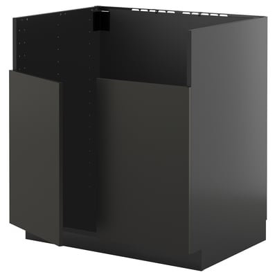 Svart köksskåp, modern design, fyrkantig form, tillverkad av spånskiva.