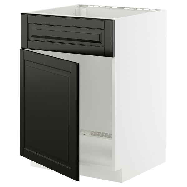 Modernt vitt köksskåp med svarta lådor, snygg design, robust ram.