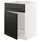 Modernt vitt köksskåp med svarta lådor, snygg design, robust ram.