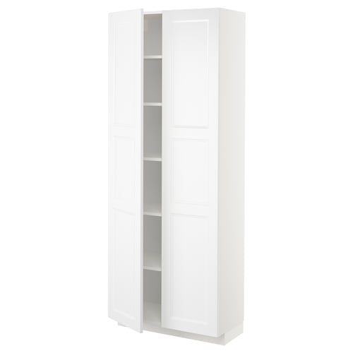 Avbildar ett vitt METOD-köksskåp med en elegant design med fyra hyllor, lämpliga för olika förvaringsbehov.
