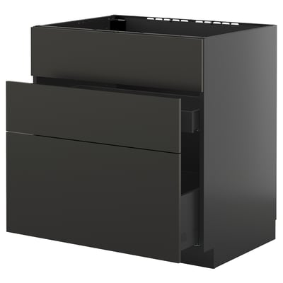 Svart modernt köksskåp med tre lådor, snygg design. En del av METOD-systemet.