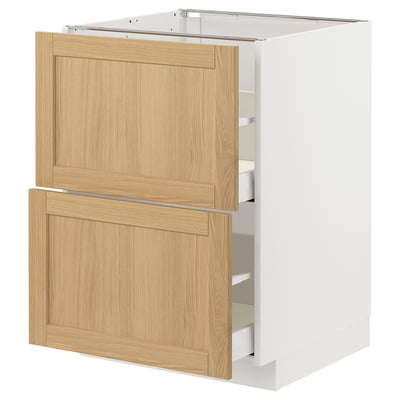 Ett ikea METOD köksskåp med lådor i vit och ekfanér.