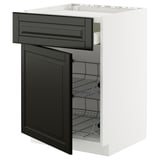 Ett vitt METOD-köksskåp med svarta bodbyn-lådor och en dörr, med en modern design med fasade kanter och metallhyllor inuti.