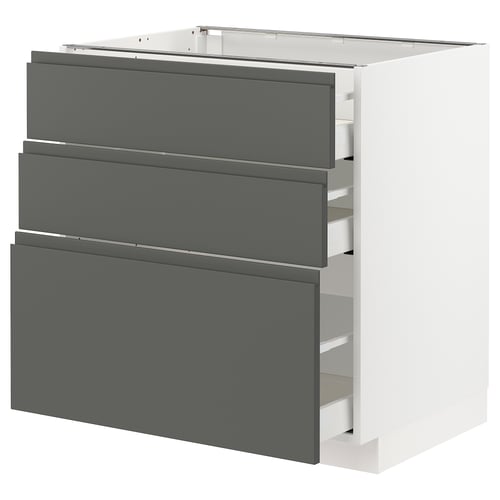 Modernt vitt köksskåp med 3 grå lådor, elegant och minimalistisk design.