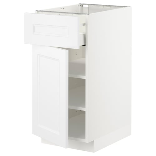Ett vitt METOD köksskåp med låda och hylla, modern och traditionell design, slät finish.