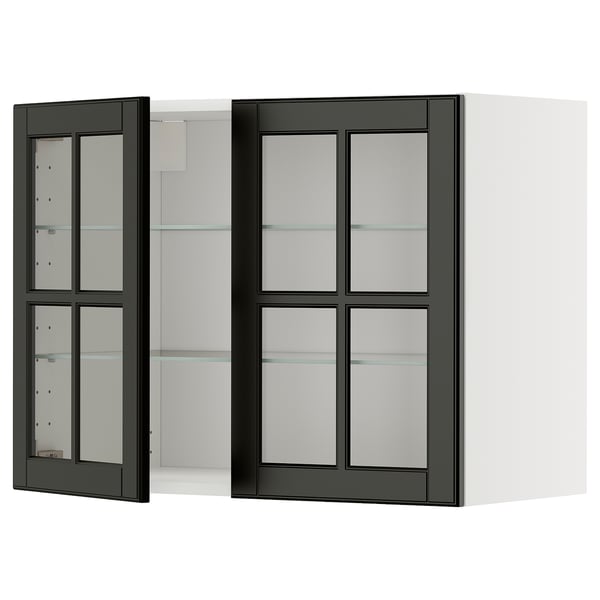 Modernt väggskåp med svart glasdörr och fasade kanter, en del av ikea METOD kökssystem.