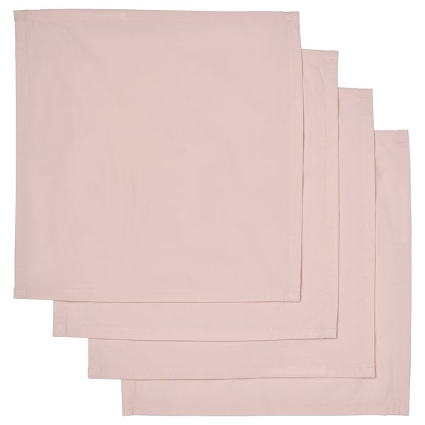 Set med fyra rosa, fyrkantiga, vändbara bomullsservetter.