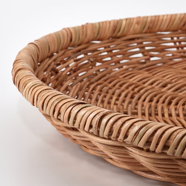 Rustik korgdetalj i flätad korg; Vävd design i naturlig rotting.