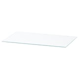 En rektangulär bordsskiva i glas som heter NORDLI. Den är klar och gjord av härdat glas.