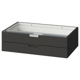 En grå NORDLI byrå med två lådor. Designen är modern och minimalistisk, tillverkad av spånskiva och fiberplatta, perfekt för förvaring.