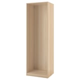 Ikea PAX garderobsstomme i ljus ek, upprätt med tomma hyllplan.