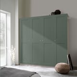 Teal PAX garderob bredvid fönster i minimalistiskt sovrum med förvaring och inredning.