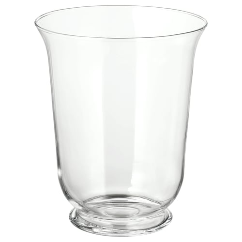 POMP, vaslykta i klarglas. Den har en elegant, böjd form och är munblåst, vilket ger den ett unikt, handgjort utseende.